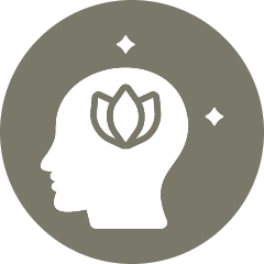 Head silhouette with lotus and stars.